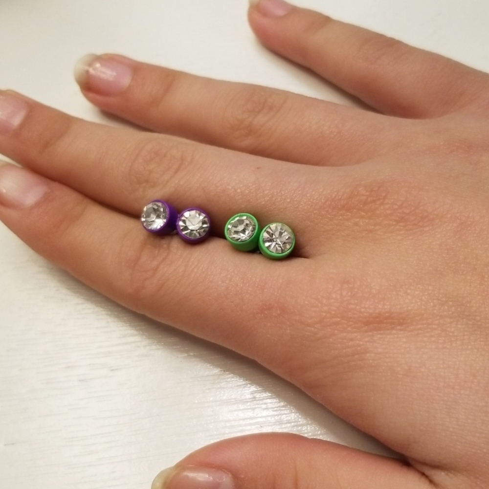 Two sets of stud earrings